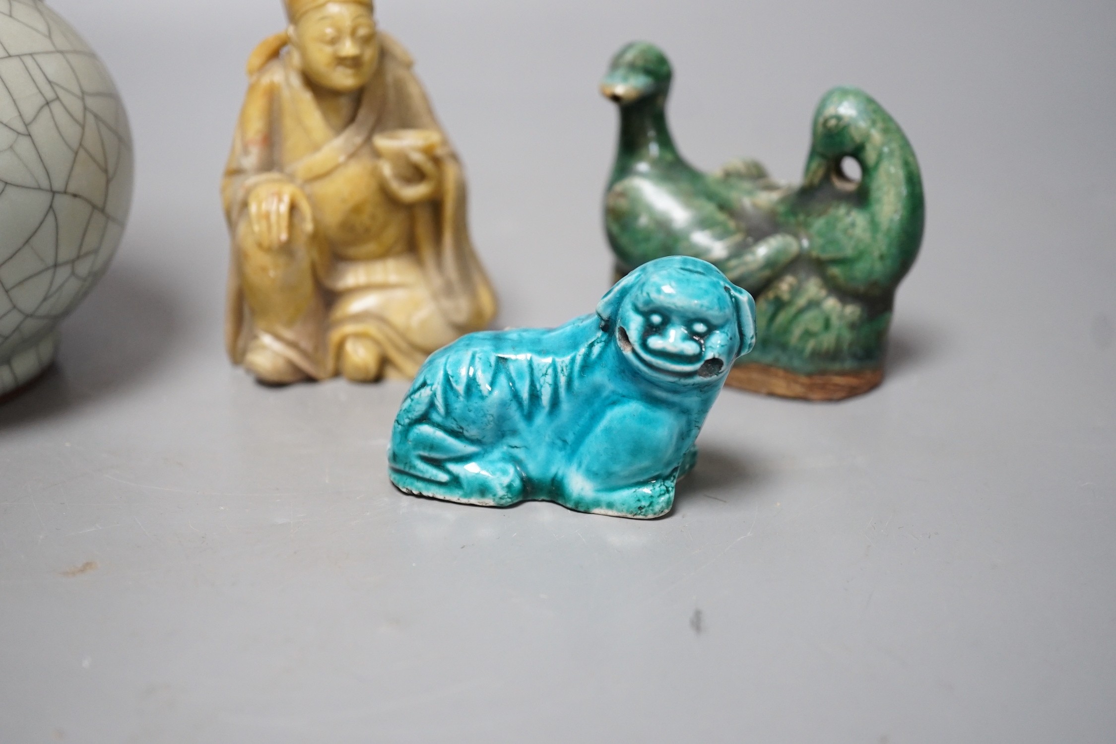 A Chinese crackle glaze vase, 15.5 cm high, two incense holders and a soapstone figure